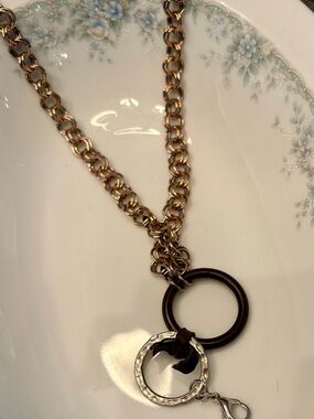 Jewel Kade Gold Tone Chain Necklace with Brown and Silver Rings